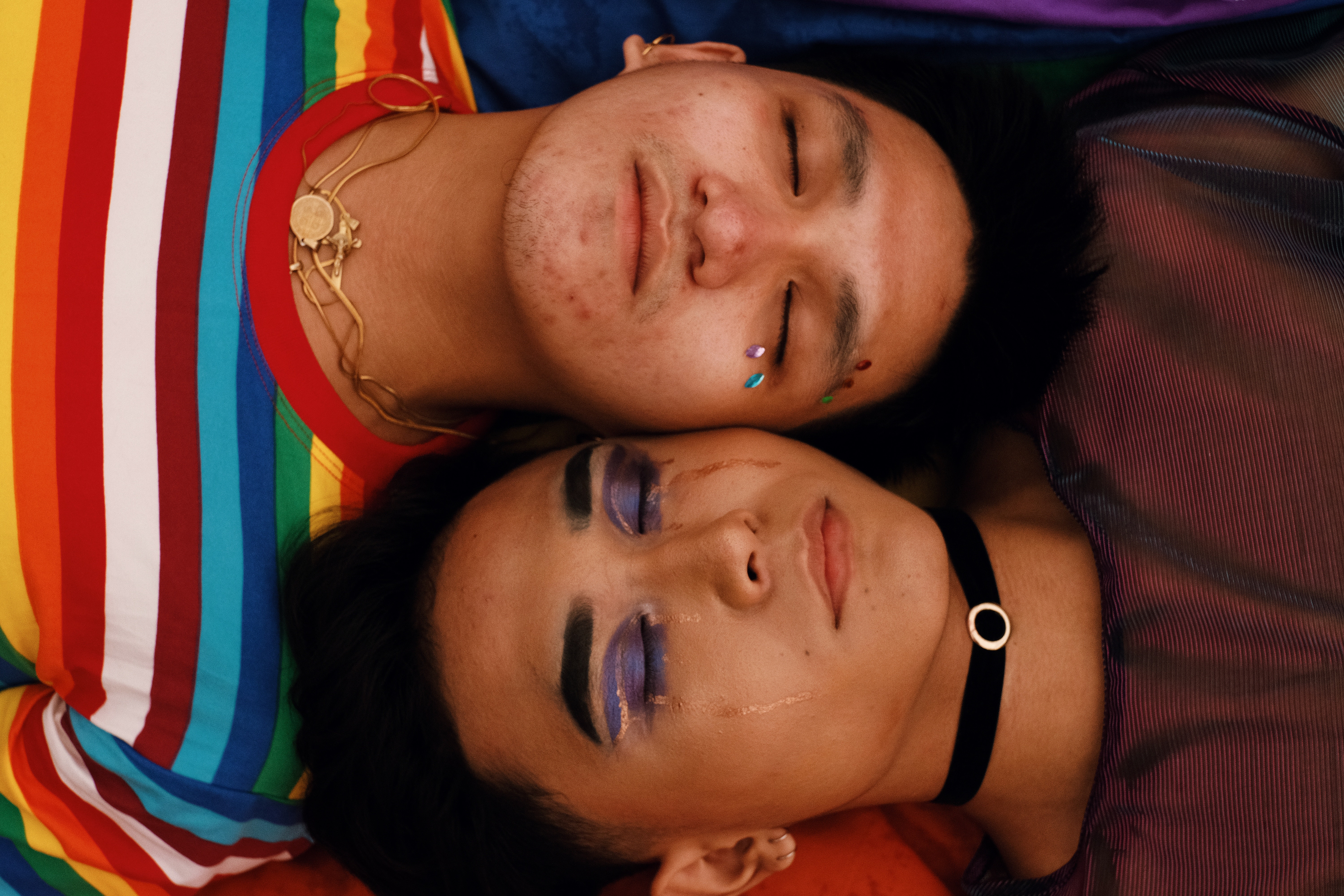 two people heads touching