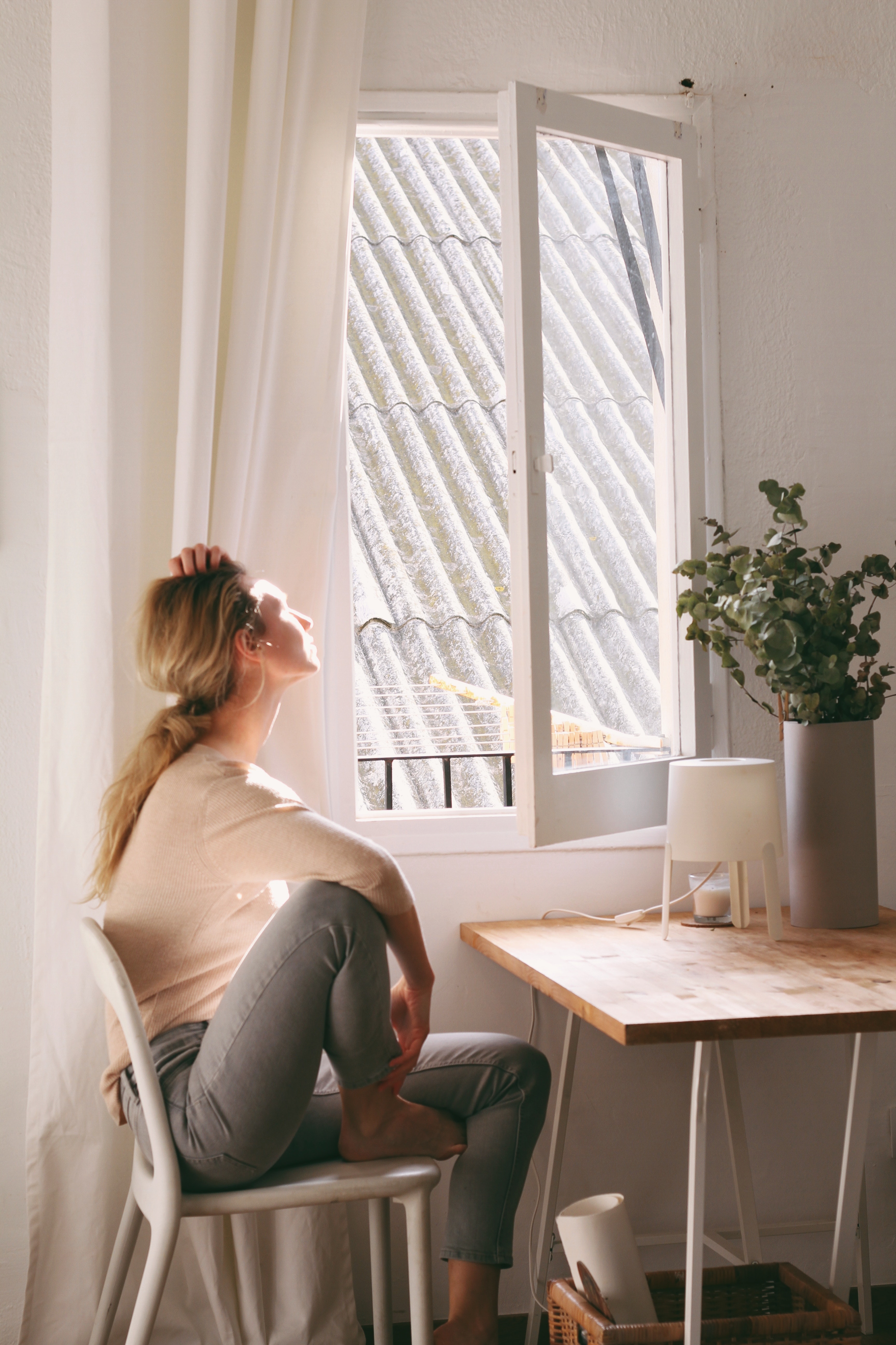 girl looking out window